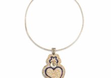 Necklace, with a laser cut filigree blue heart
